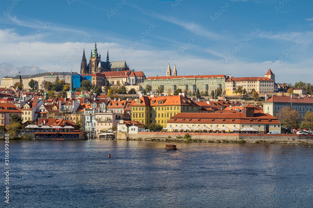 View of colorful old town and Prague castle with river Vltava, Czech Republic