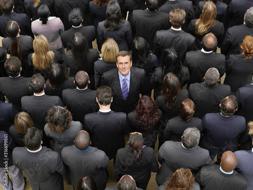 Fotografi Overhead photo of large gathering of people in a large business crowd