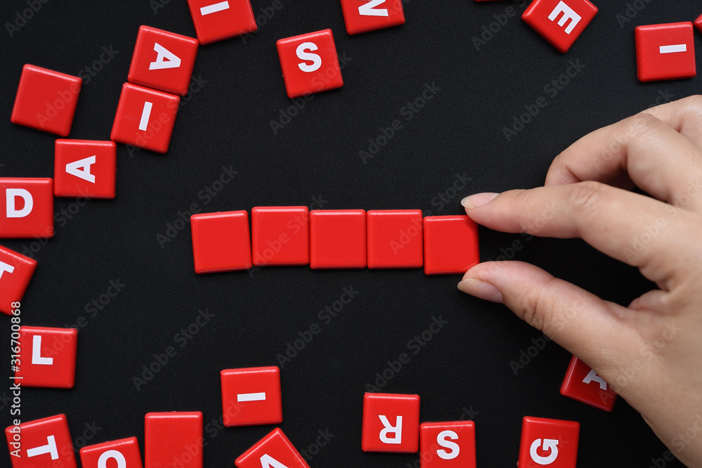 close up of english alphabet on black background close up of english alphabet on black background