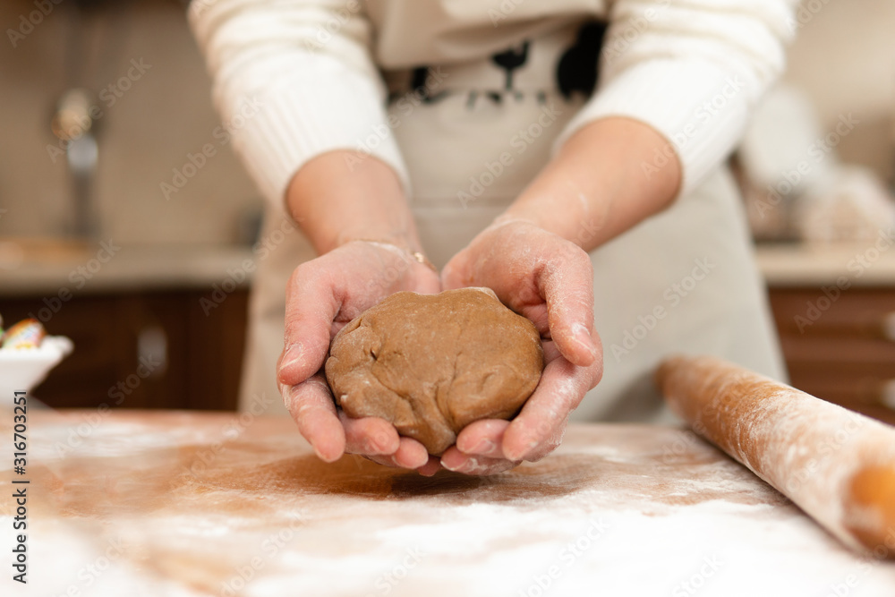 Women prepare cookies in the kitchen concept cooking