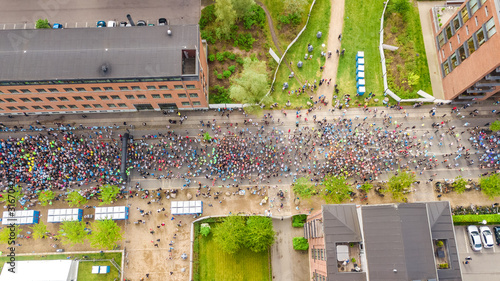 Photography Marathon running race, aerial view of start and finish line with many runners fr