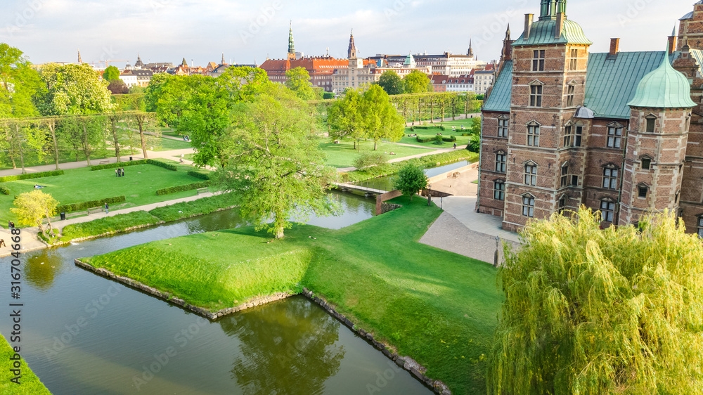 Aerial drone view of Rosenborg Slot Castle and beautiful garden from above, Kongens Have park in Copenhagen, Denmark