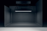 Photo studio with lighting equipment and black background