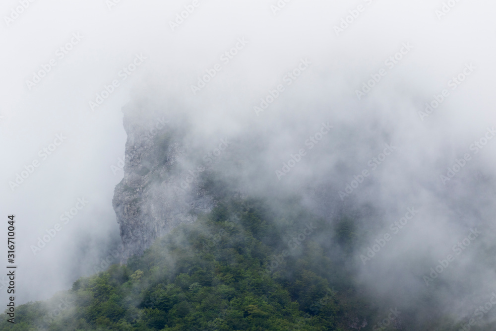 Rain clouds over Klek mountain, Croatia