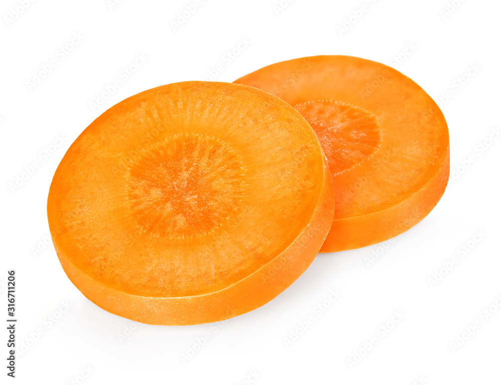Carrot slices isolated close-up on white background. Carrot slices isolated close-up on white background.