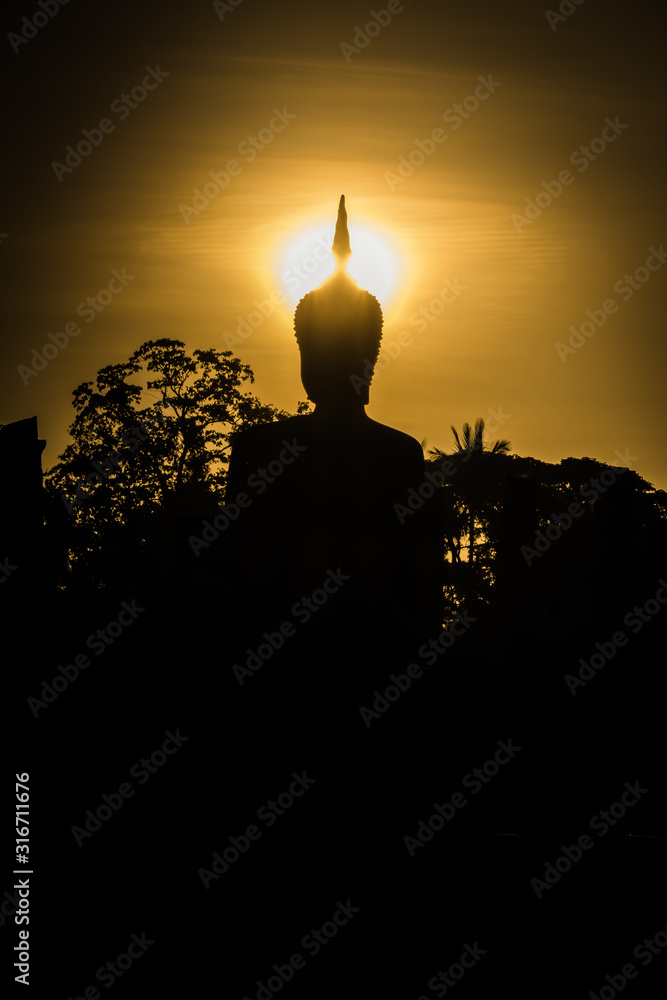 Ancient Buddha Statue at Sukhothai historical park, Mahathat Temple, Thailand. UNESCO World Heritage Site in Thailand.