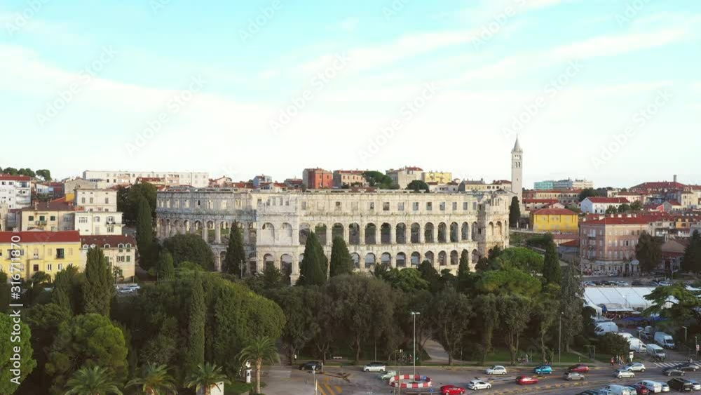 Croatia, city of Pula, ancient Roman arena, historic amphitheater and old town center fron drone, aerial view Croatia, city of Pula, ancient Roman arena, historic amphitheater and old town center fron drone, aerial view