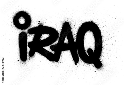 graffiti Iraq word sprayed in black over white