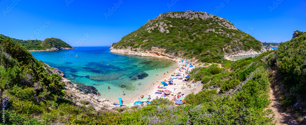 Panorama view of Porto Timoni beach at Afionas is a paradise double beach with crystal clear azure water in Corfu, Ionian island, Greece, Europe