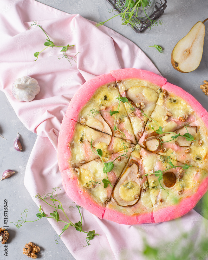 Pink pizza with spirulina or matcha. Spring menu. Super food Stock Photo |  Adobe Stock