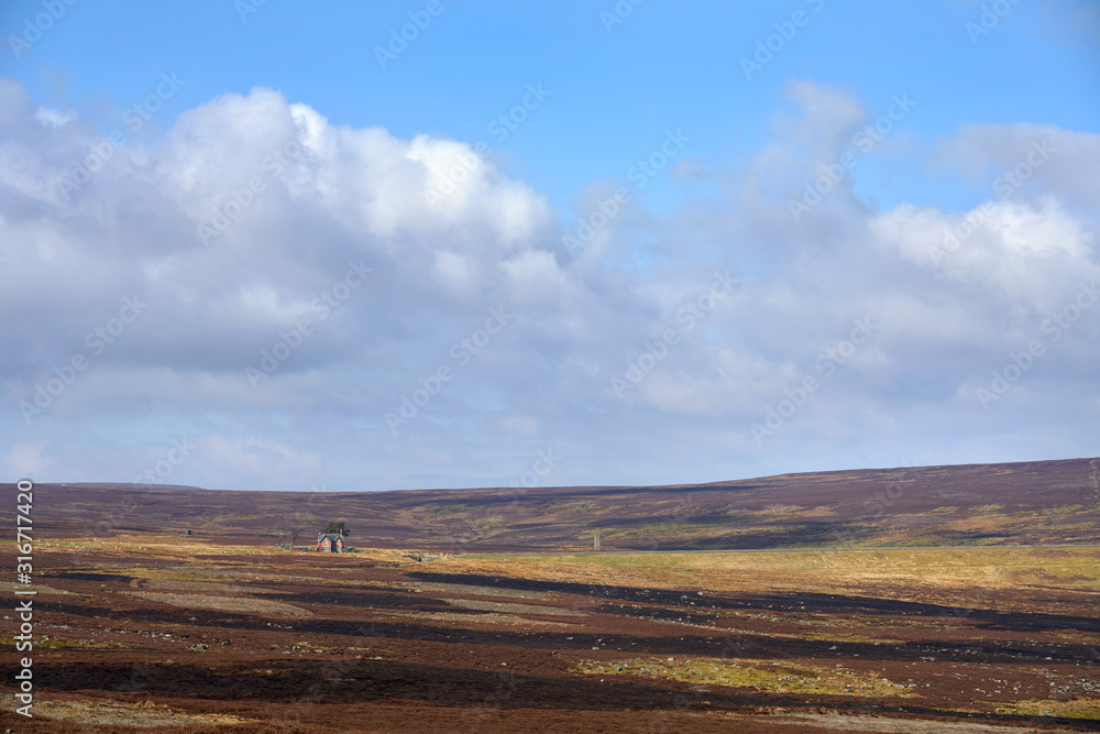 A very remote, isolated house on the moors with open moorland for miles around, Muggleswick Common, England, UK.