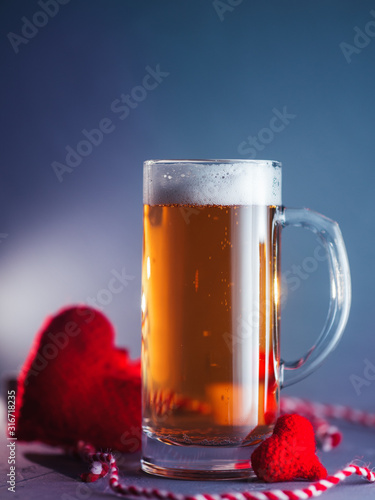 A glass of light beer for Valentine's day and a red heart