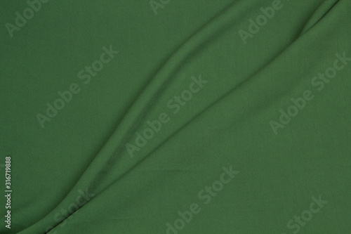 Wallpaper Mural Fabric suit fold top view. Green textile Torontodigital.ca