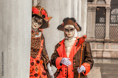 Colorful carnival masks at a traditional festival in Venice, Italy photo