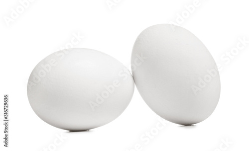 Two fresh white chicken egg...