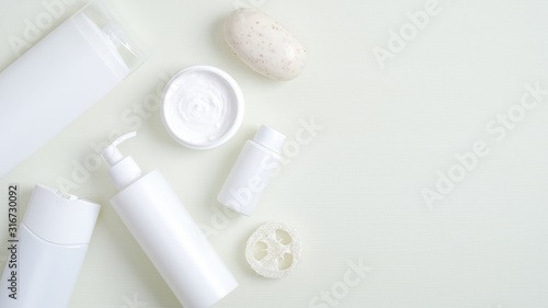 Cosmetics SPA branding mockup. Top view beauty product packaging, shampoo bottle, shower gel container, body cream jar, natural organic soap, essential oil for hair, bath luffa sponge