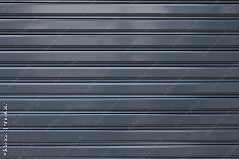 black roller shutter door closed security background black roller shutter door closed security background