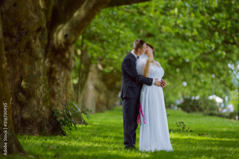 Bride and groom at a photo session in the nature Bride and groom at a photo session in the nature