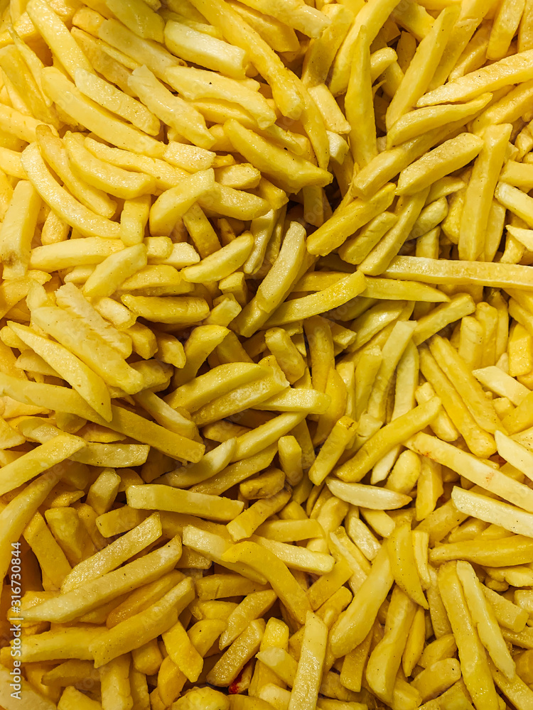 lots of delicious fries for eating like a background lots of delicious fries for eating like a background