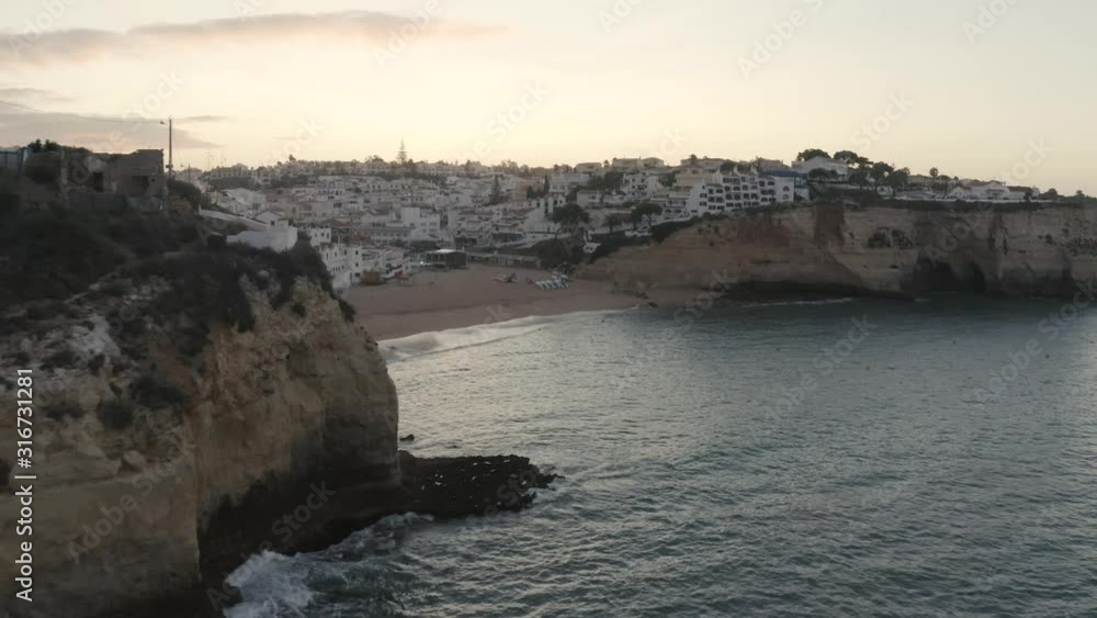 AERIAL : Algarve, The Carvoeiro beach early morning AERIAL : Algarve, The Carvoeiro beach early morning
