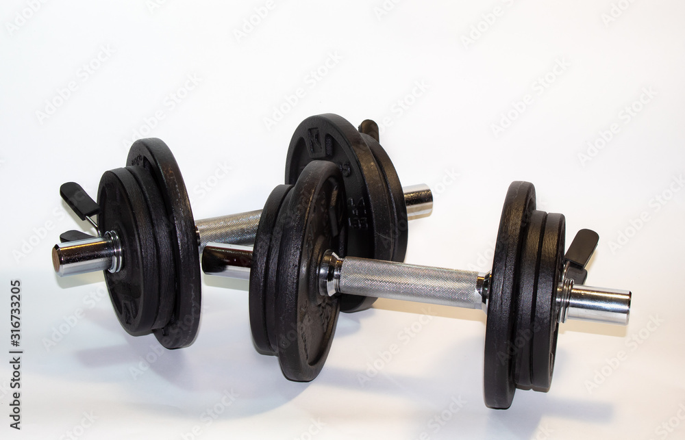 Beautiful photo of Isolated set of dumbbells