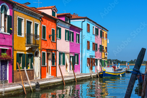 Amazing view of colorful houses in Burano, Venice, Italy. © Ekaterina Loginova