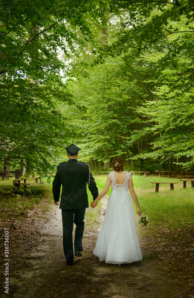 Bride and groom at a photo session in the nature