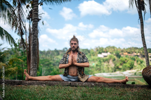 Man practice Yoga practice and meditation outdoor © grthirteen