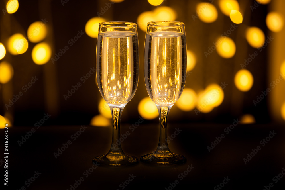 Two glasses of pink champagne for the couple. Two glasses of pink champagne for the couple.