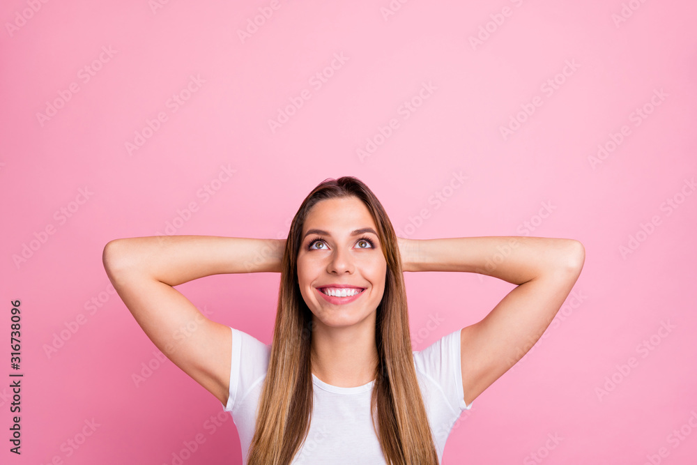 Fototapeta premium Closeup photo of beautiful pretty lady peaceful harmonic mood looking up empty space holding arms behind head wear casual white t-shirt isolated pink color background