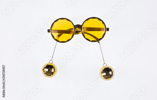 yellow party sunglasses isolated on white background