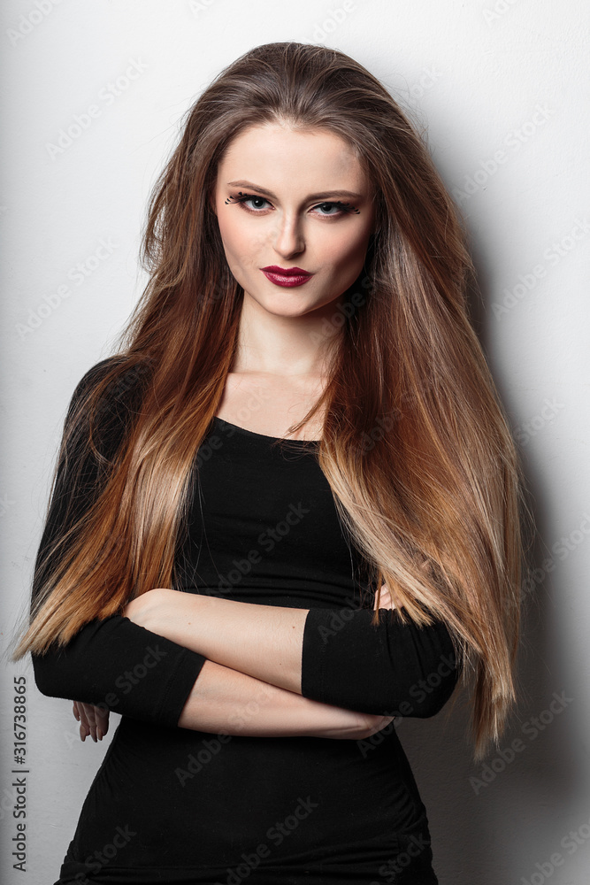 beauty portrait of young woman with fashion makeup and fantasy eyelashes beauty portrait of young woman with fashion makeup and fantasy eyelashes