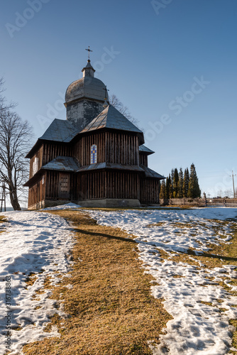 Fototapeta Naklejka Na Ścianę i Meble -  Wooden Orthodox Church in Hoszowczyk. Carpathian Mountains and Bieszczady Architecture in Winter