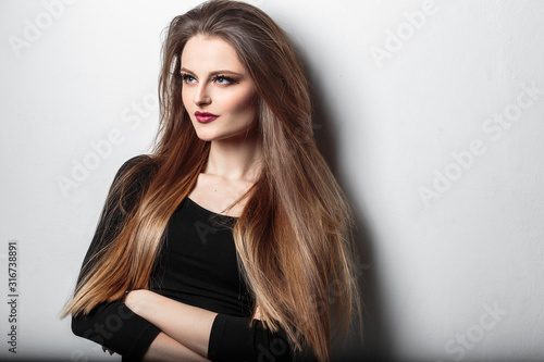 beauty portrait of young woman with fashion makeup and fantasy eyelashes