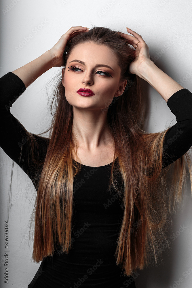 Fototapeta premium beauty portrait of young woman with fashion makeup and fantasy eyelashes