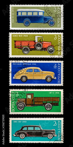 USSR - CIRCA 1970 Postage Stamp collection - Macro photography of old russian stamps illustrating soviet automobile. Vintage philately collectible piece. Museum souvenir. photo