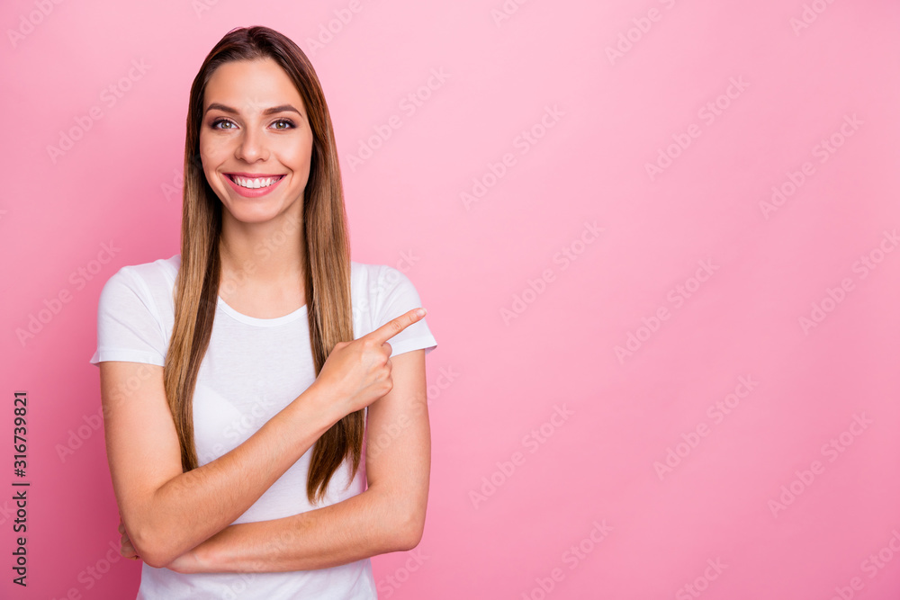 Portrait of positive cool girl promoter point index finger copyspace recommend ads sales wear casual style clothing isolated over pink color background Portrait of positive cool girl promoter point index finger copyspace recommend ads sales wear casual style clothing isolated over pink color background