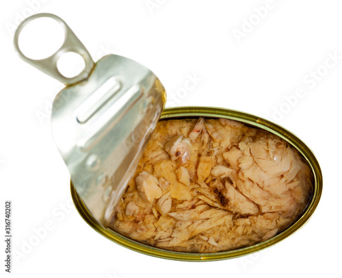 Glass jar with canned tuna in oil