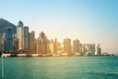 Blur image of city Skyline and ocean coast 