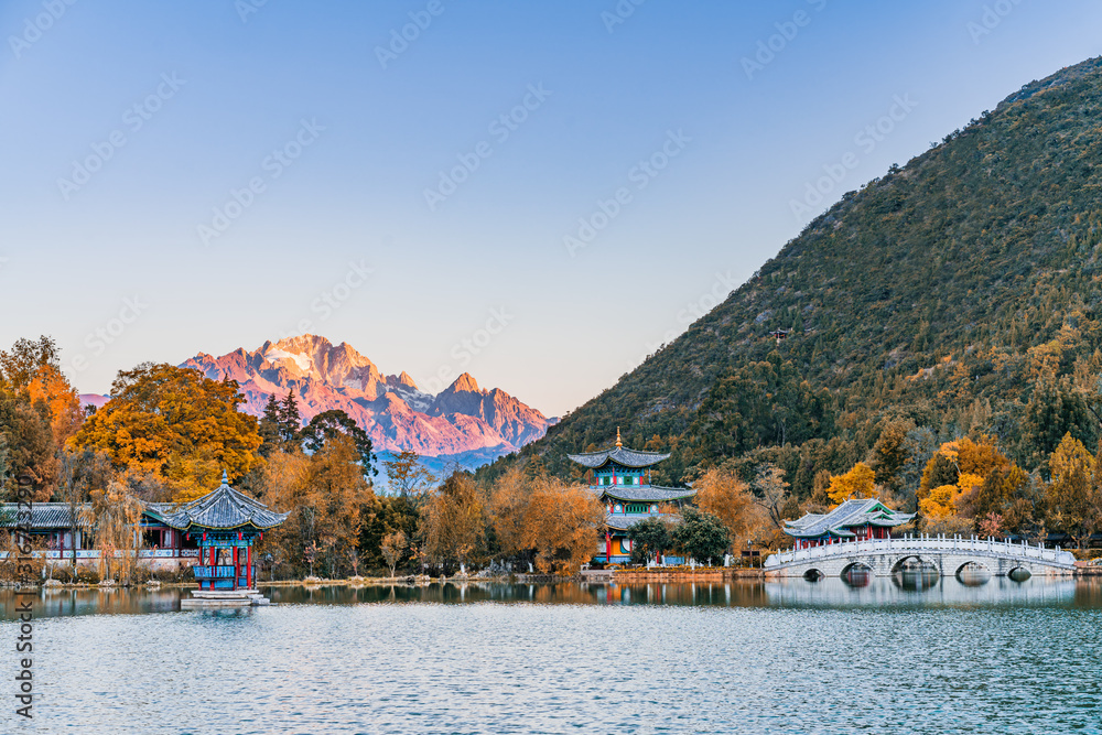 Early morning scenery of Yulong Snow Mountain and Black Dragon Lake in Lijiang, Yunnan, China
