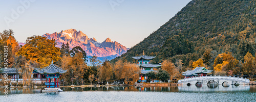 Early morning scenery of Yulong Snow Mountain and Black Dragon Lake in Lijiang, Yunnan, China