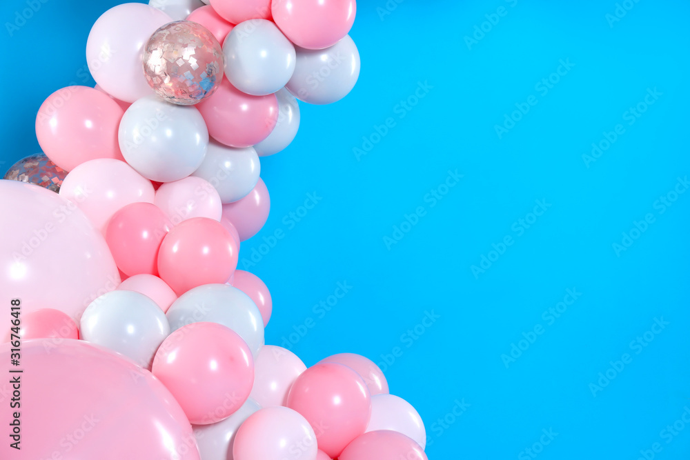 Beautiful composition with balloons on blue background. Space for text
