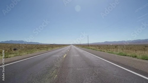 Historic Route 66 with dead end road on original pavement in Texas and New Mexico. Includes three different video sequences! photo