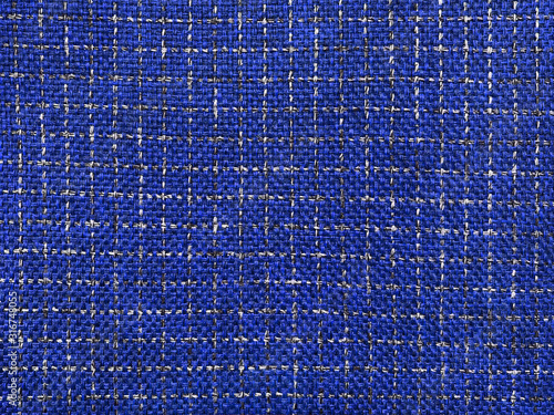 Fabric of blue check lurex with coarse thread. photo