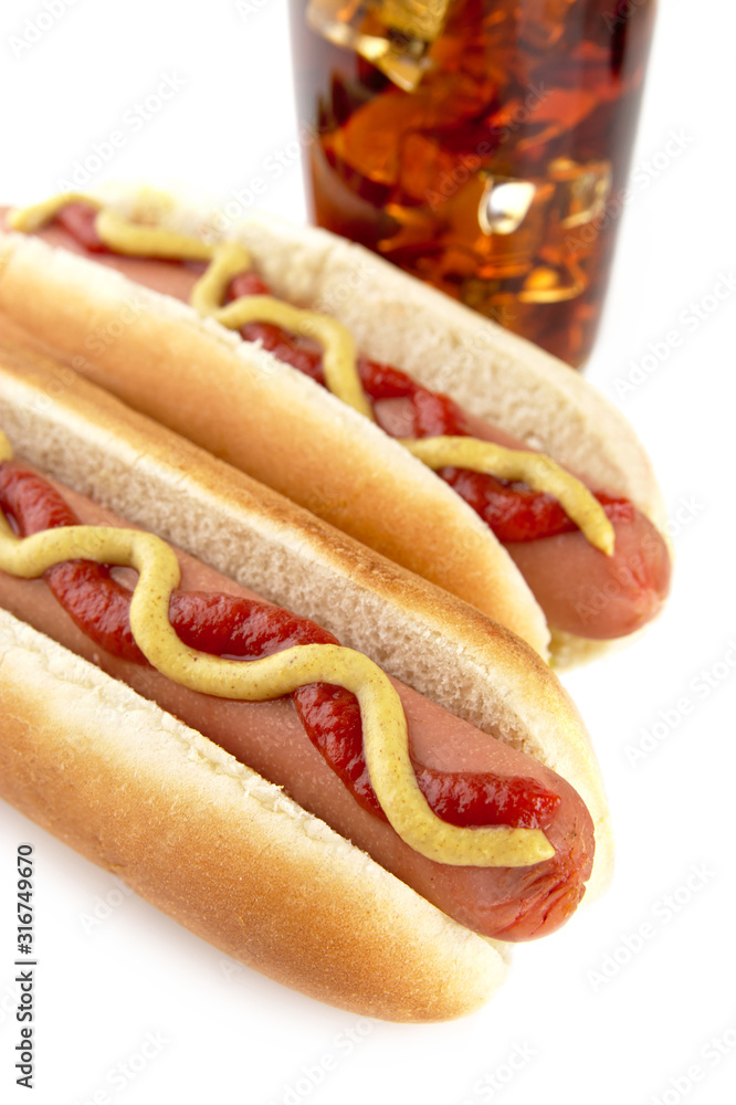 Hotdogs with cola drink isolated on white background Hotdogs with cola drink isolated on white background
