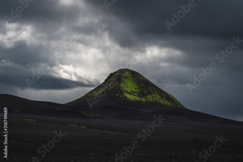 Single black stone mountain on the Laugavegur trek in Iceland