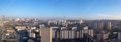 Panoramic view from drone of city landscape with buildings.