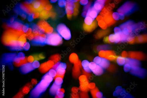 colorful abstract bokeh and line moveing from center. Background for a night club. bokeh and flare of blured background night scene in concert party