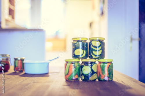 Wallpaper Mural Variety of tasty vegetables in preserving glasses. Conservation of food. Torontodigital.ca