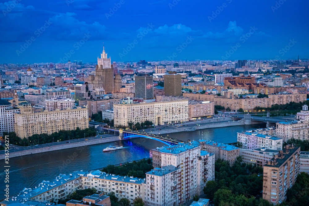 Russia. Moscow skyline. Tour of the Moscow River.Embankment of Moscow river top view. Center of the capital of Russia. Traveling in Russia. Bridges of the capital. Buildings Russian Capital.